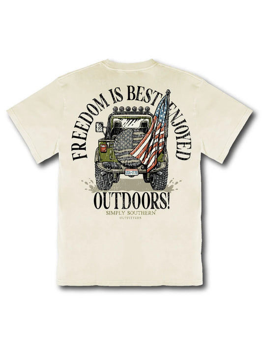 Beige unisex tee with Jeep, dog, US flag graphic, slogan on back. Sizes: S-XXL.