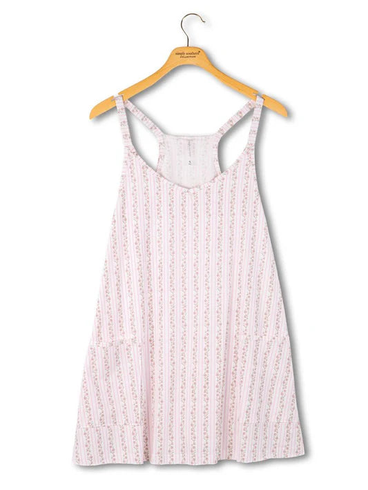 Sleeveless, knee-length Tara Dress in White Floral with pink stripes, floral print, front pockets, racerback. Sizes XS-XL.