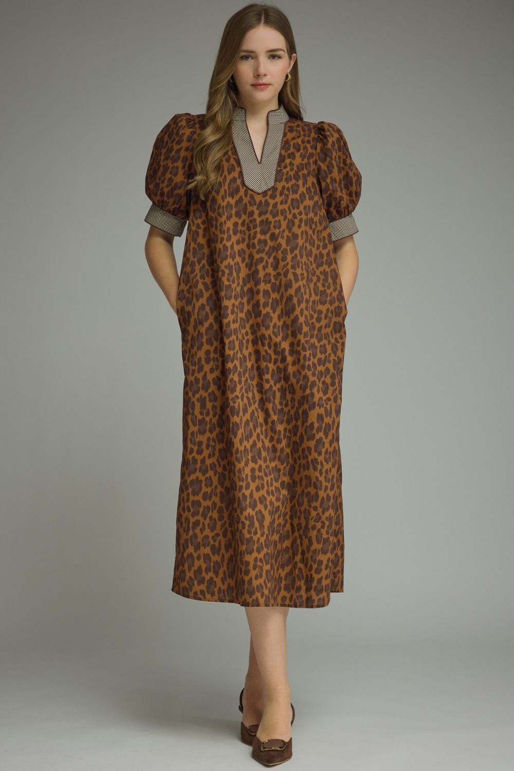 Brown Leopard Print Maxi Dress with puffed short sleeves, v-neckline, and functional pockets. Available in sizes XS–XL.