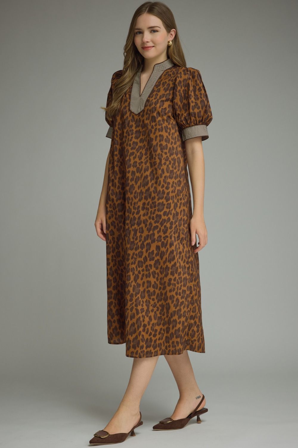 Brown Leopard Print Maxi Dress with puffed short sleeves and functional pockets. Available in sizes XS-XL.