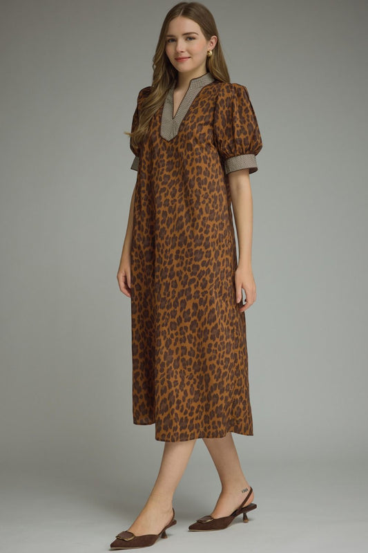 Brown Leopard Print Maxi Dress with puffed short sleeves and functional pockets. Available in sizes XS-XL.
