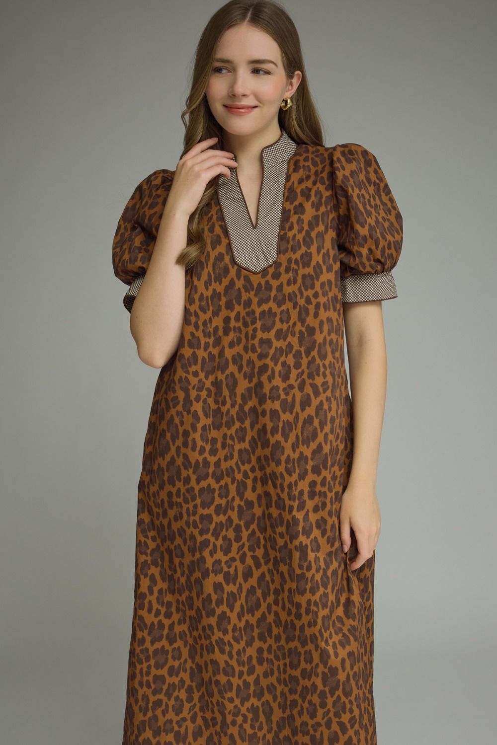 Brown Leopard Print Maxi Dress with puff sleeves, V-neckline, and functional pockets. Available in sizes XS–XL.