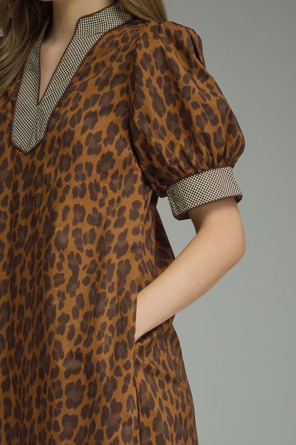Brown Leopard Print Maxi Dress with checkered trim on collar and sleeve cuffs, plus a functional pocket. Available in sizes S-XL.