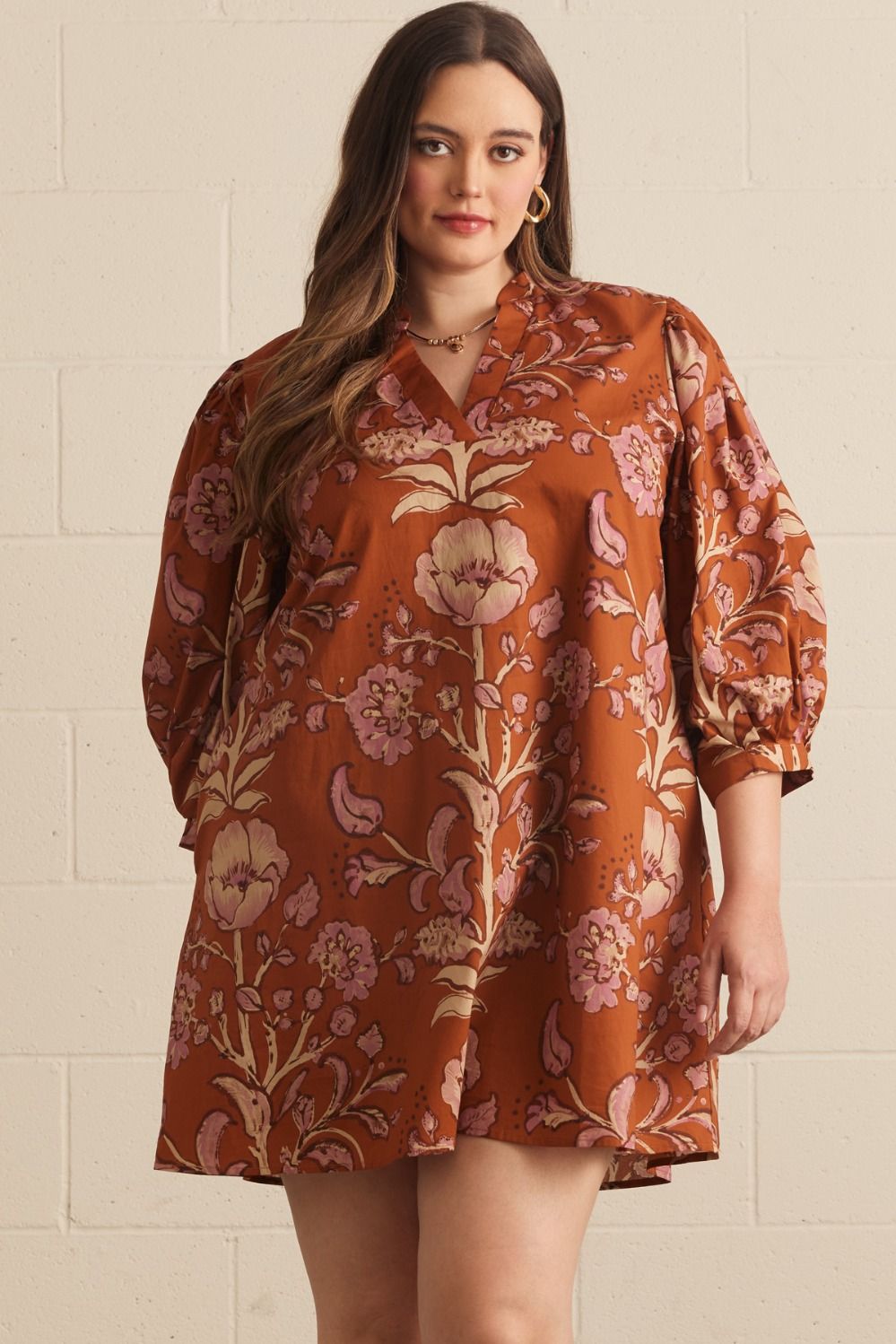Autumn Rust Long-sleeve Dress with pink and cream floral patterns. Available in sizes XS–XL.