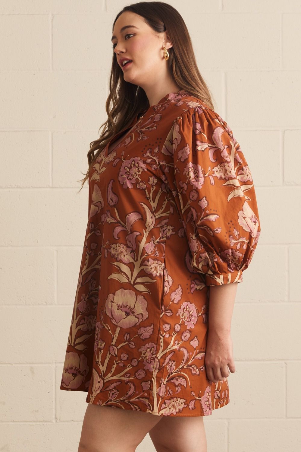 Autumn Rust Long-sleeve Dress with floral pattern. Available in sizes XS–XL.