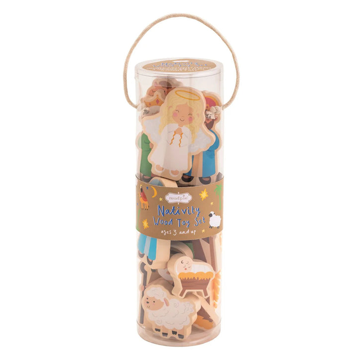 Wooden Nativity toy set figures in a clear cylindrical plastic tube with a rope handle.