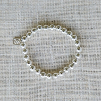 Shiny Silver Bracelet with nickel-free silver beads and a square charm. Available sizes: S, M, L.