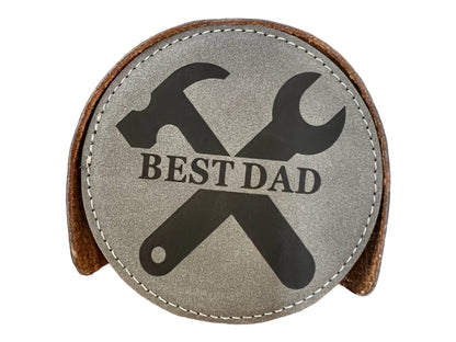 Round leather "BEST DAD" coaster with printed crossed hammer and wrench; available in 4-inch and 6-inch sizes.