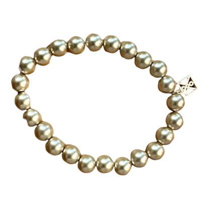 Matte Gold Bracelet with round, light pearls and gold square charm. Hypoallergenic. Available in S, M, L sizes.