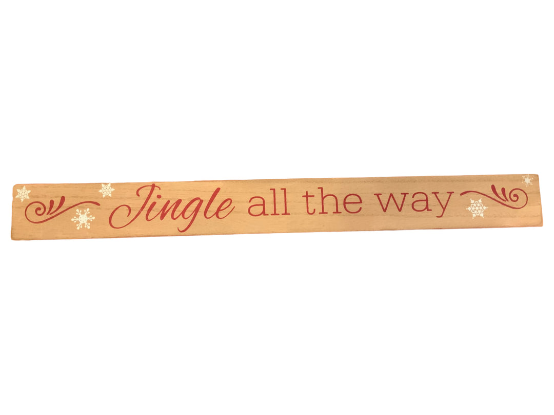 Long, rectangular wood Christmas sign featuring red “Jingle all the way” text with decorative swirls and snowflakes.