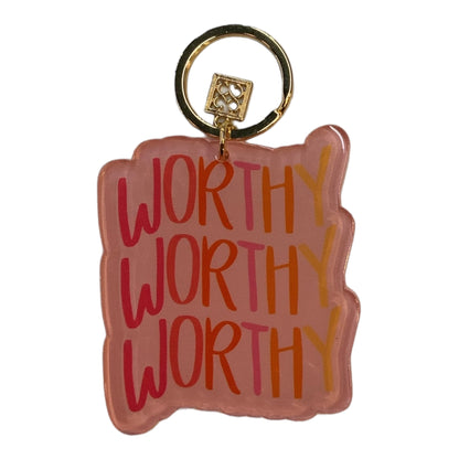 Mary Square Acrylic Keychain: "WORTHY" repeated in orange, red, pink on pink acrylic with gold hardware. Sizes available.