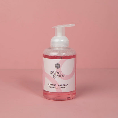 Sweet Grace Foaming Hand Soap, clear pump bottle, 16.6FL oz, pink liquid, white label with pink accents, aloe formula.