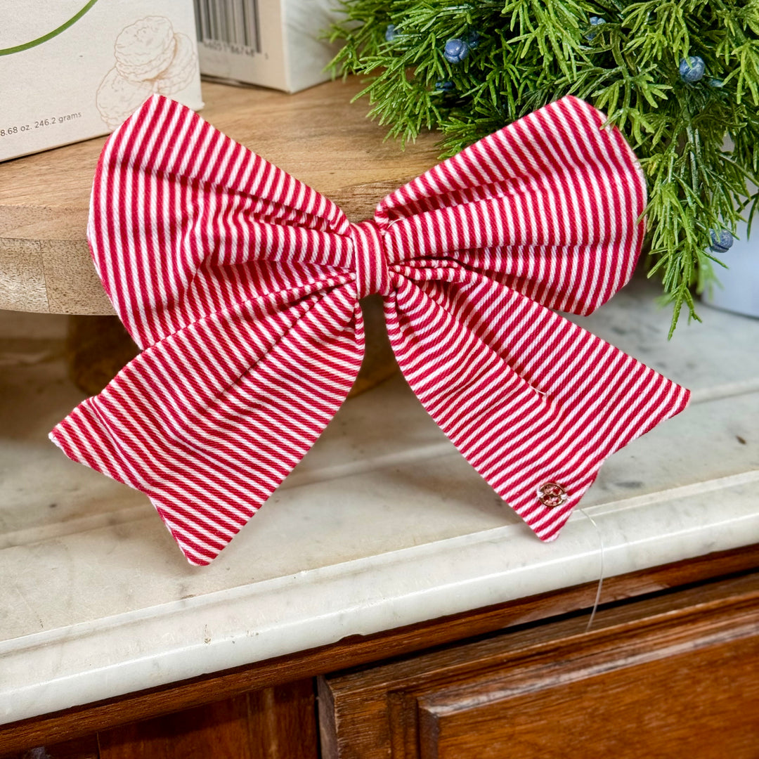 Red and white striped magnetic holiday bows.