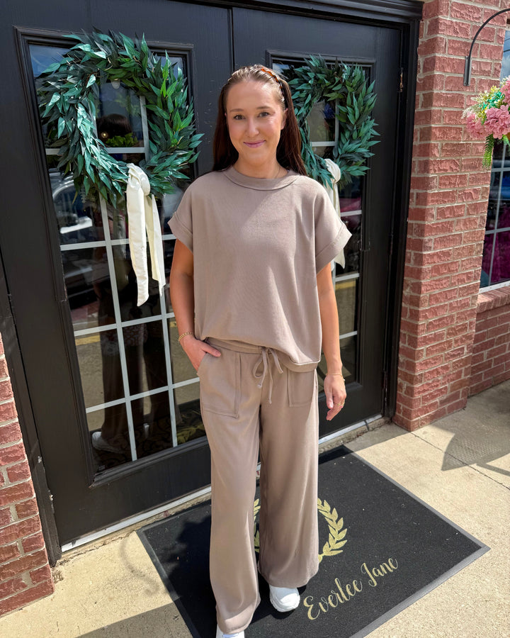 Taupe Scout Ribbed Set: short-sleeve top and wide-leg drawstring pants with pockets. Available in sizes XS-XL.