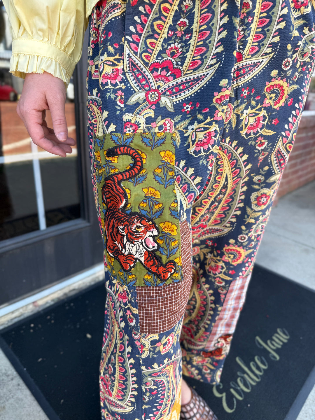 Tiger Barrel Pant in blue paisley print with tiger thigh patch and patterned accents. Sizes available: [Insert Sizes].