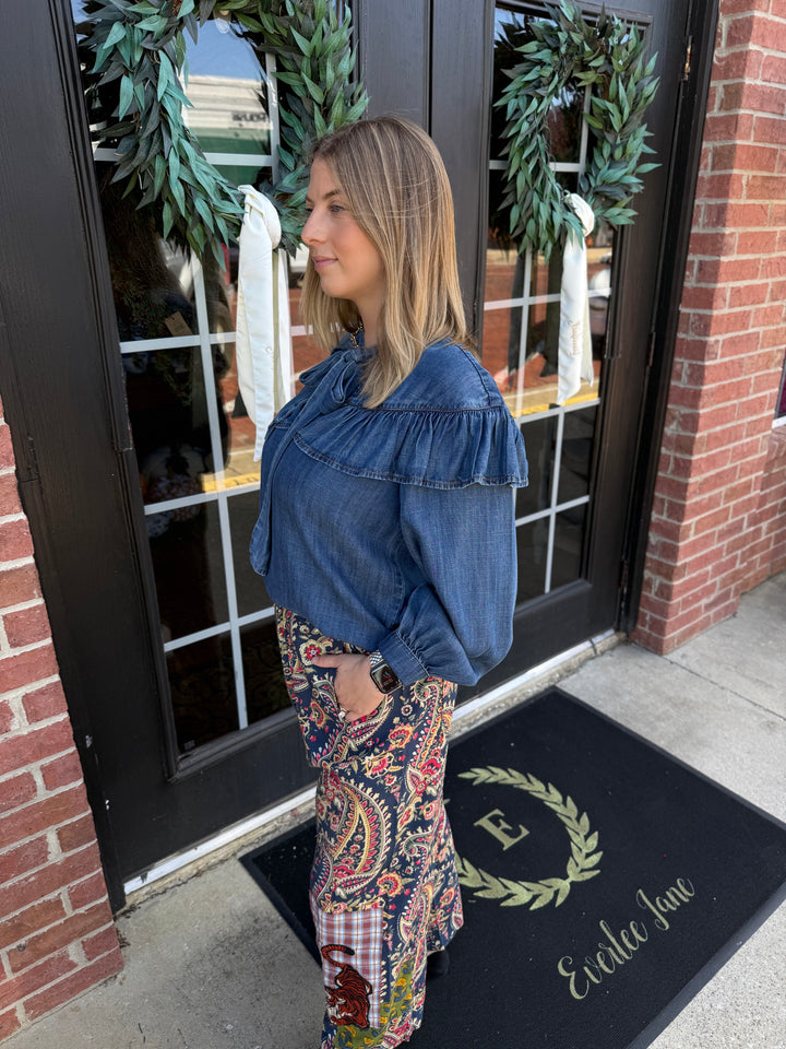Tiger Barrel wide-leg pant with dark blue, red, and yellow paisley print and tiger graphic patch. Sizes available.