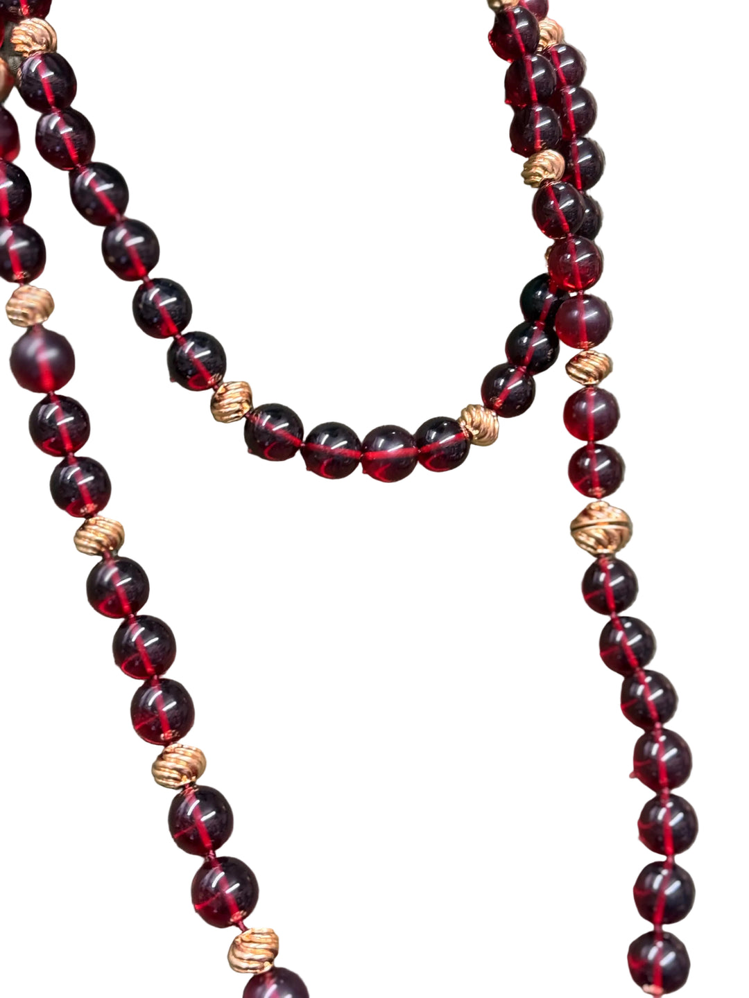 Ravello 5-in-1 Gold Necklace in cranberry, featuring multi-strand, adjustable length translucent deep red beads and textured gold-tone beads. Available in multiple sizes.