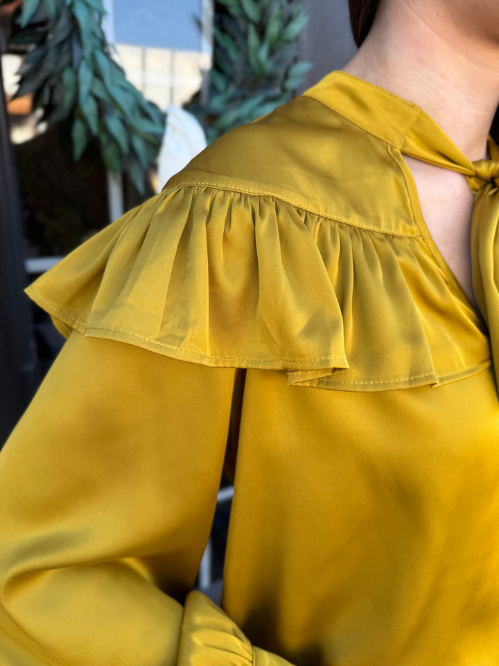 Chartreuse silky bow neck top with ruffled shoulders. Available in multiple sizes.