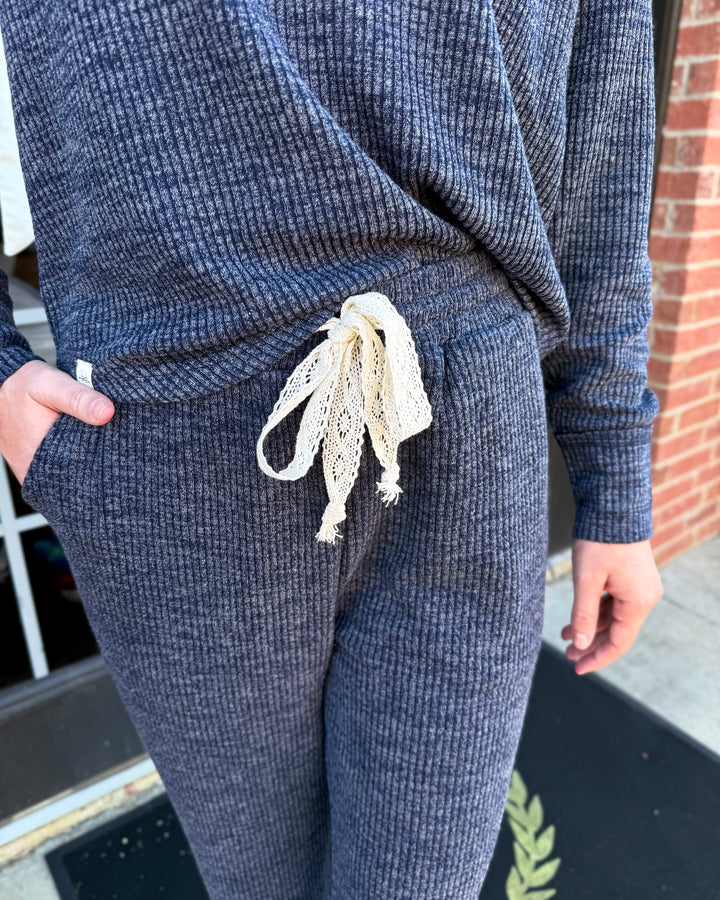 Knit Cord Pant: Dusk dark gray, straight-leg, textured knit pull-on pants with a cream lace drawstring elastic waistband. Sizes available.