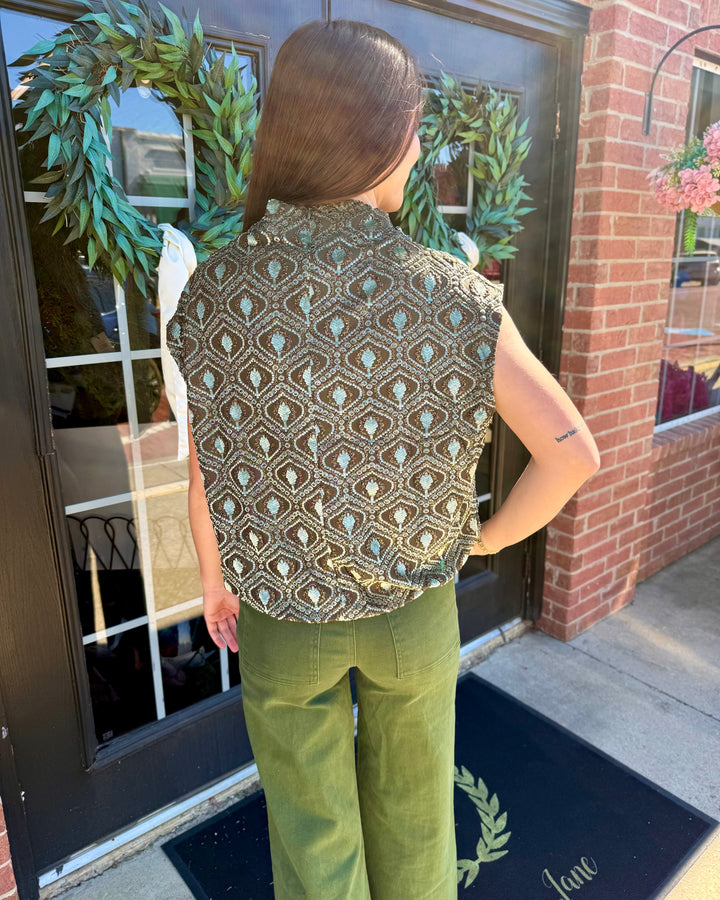 Sage Velvet Mock Neck Top in a brown and blue geometric pattern, sleeveless, bubble silhouette. Available in various sizes.