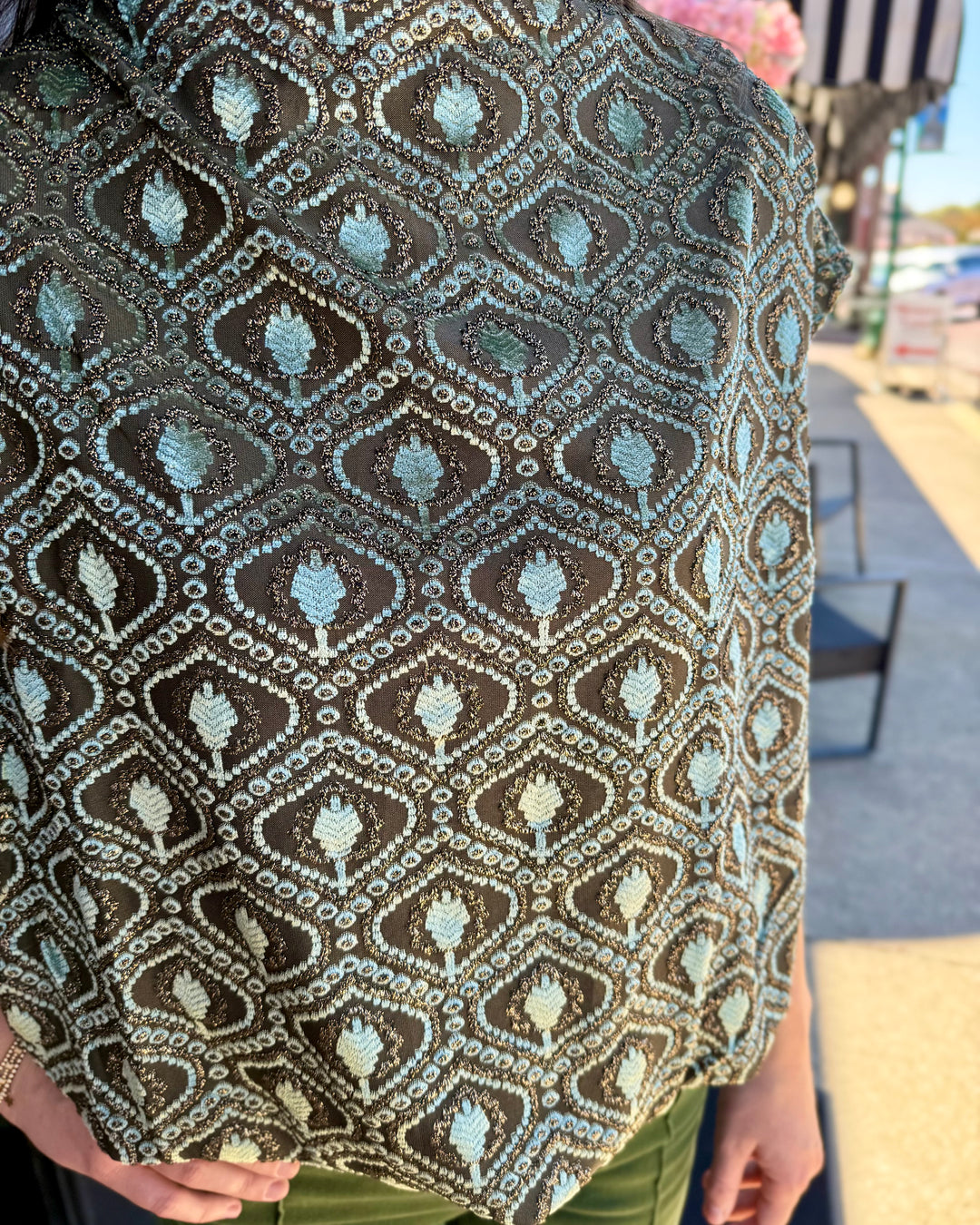 Sage velvet mock neck top with teal and metallic gold diamond and leaf pattern and bubble silhouette. Available in various sizes.