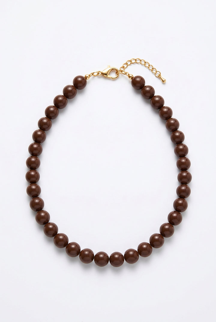 Sunset Beaded Necklace: graduated round dark purple beads, silver-tone metal clasp.