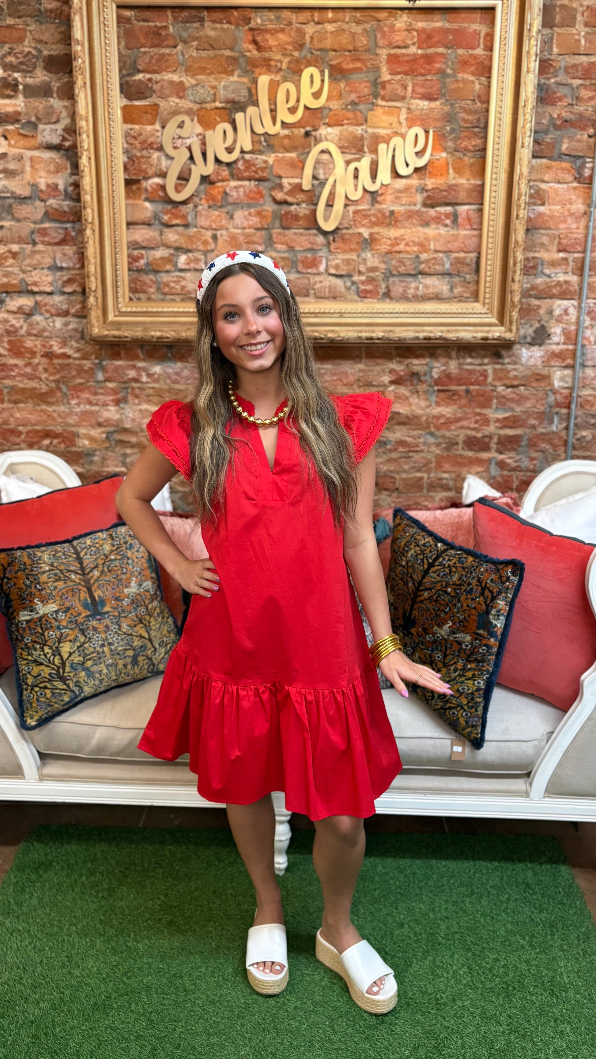 Sierra Red Dress with white sandals. Available in sizes XS-XL.