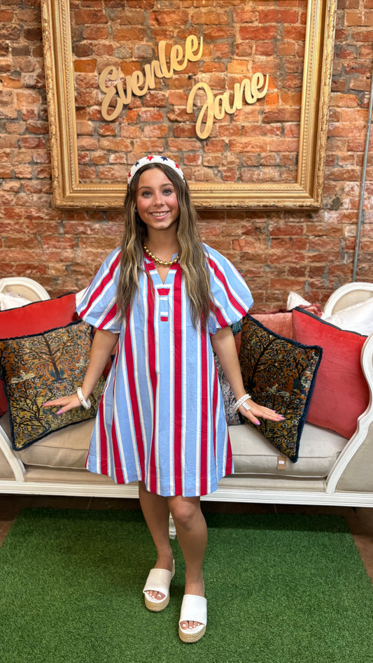 American Darling Stripe Dress with puff sleeves; available in sizes XS–XL.