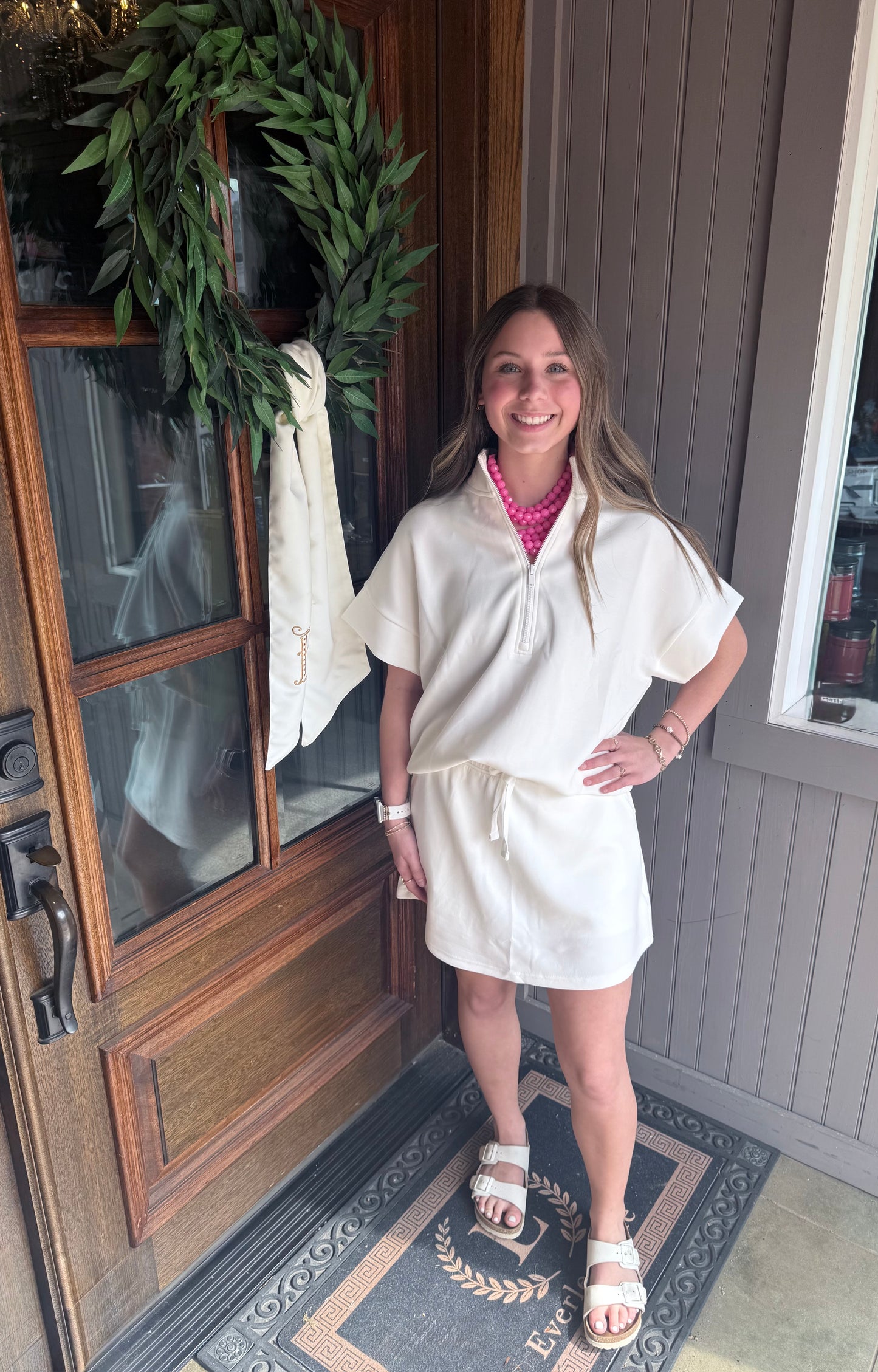 Modal Scuba Quarter Zip Short Sleeve Top in white, worn as a dress. Available sizes: XS-XL.