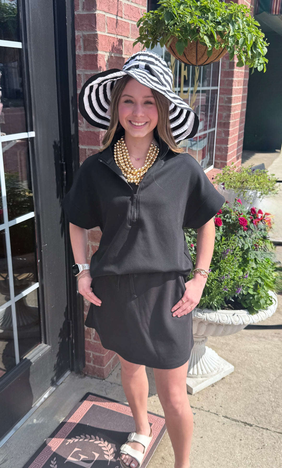 Modal Scuba Quarter Zip Short Sleeve Top shown; available in sizes XS-XL.