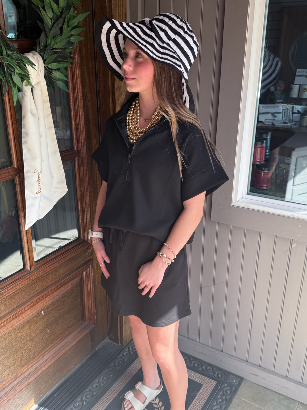 Modal Scuba Quarter Zip Short Sleeve Top shown; available in sizes XS-XL.
