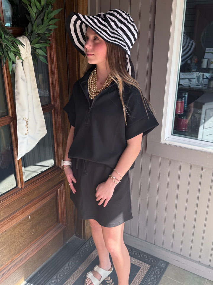 Modal Scuba Quarter Zip Short Sleeve Top shown; available in sizes XS-XL.