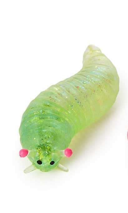 Translucent green glittery Squishy Glitter Slug sensory toy with black eyes and pink antennae. Available in various sizes.