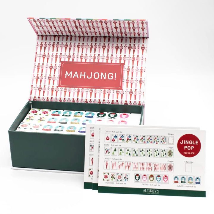 American Mahjong set in a patterned storage box with a Jingle Pop tile guide.