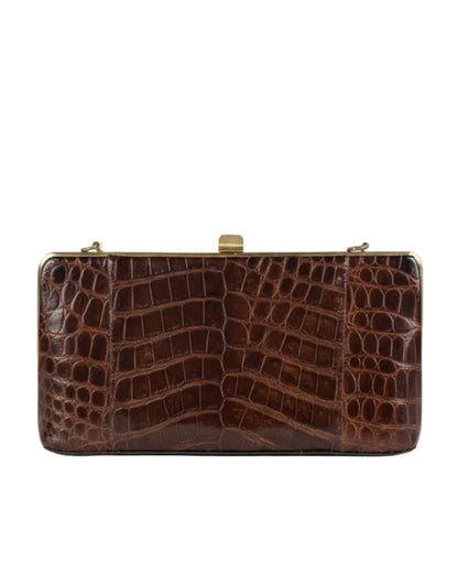 Rectangular vintage-style brown alligator clutch with gold clasp and gold trim. Available in one size.