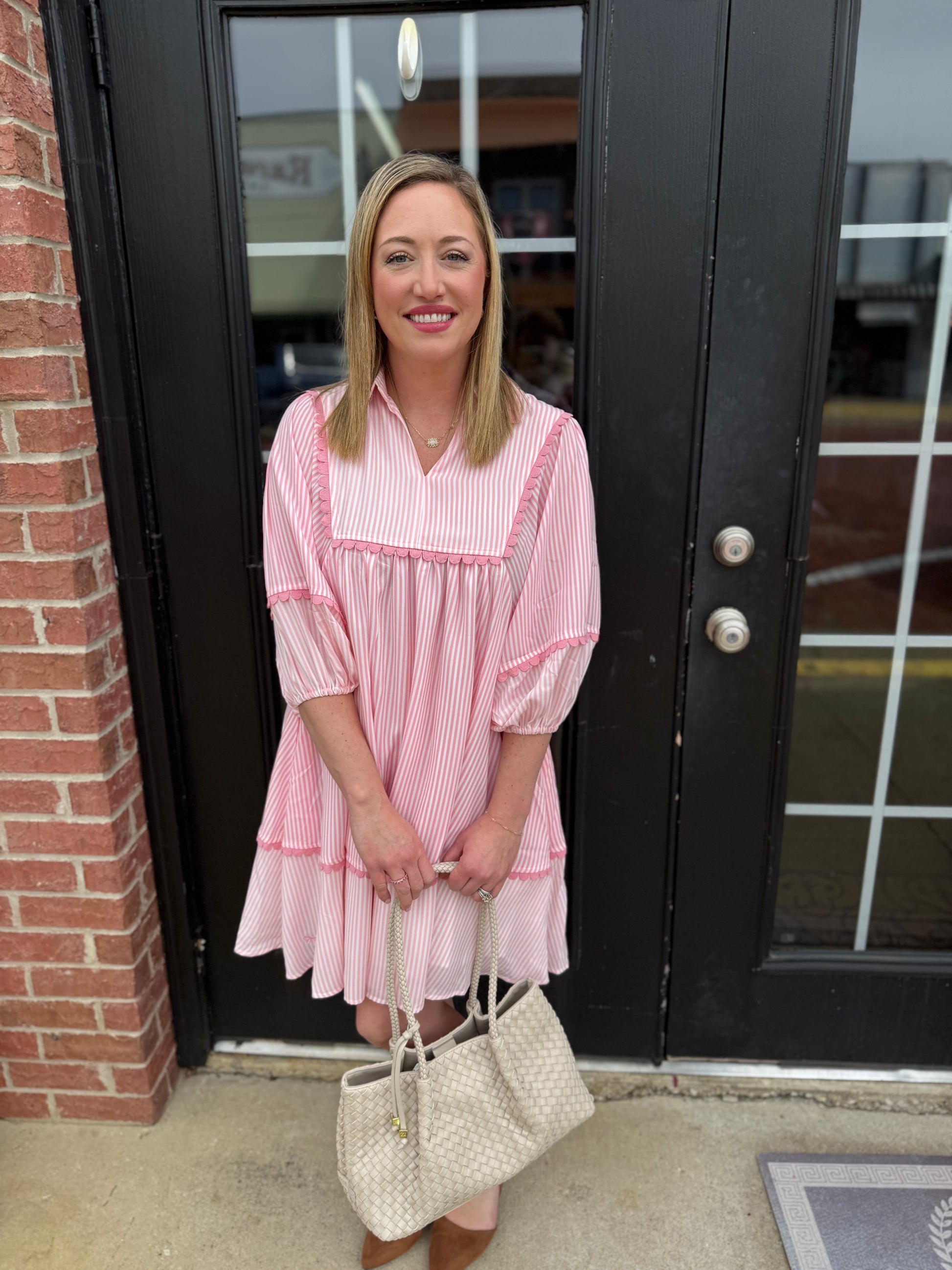 Pink Coastal Patch Dress in lightweight fabric, available in sizes XS-XL. Features a relaxed fit and vibrant patchwork pattern.