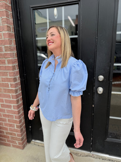 Seersucker Blue Striped Top with breathable fabric and versatile style; available in sizes XS–XL.