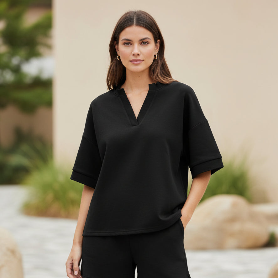 Black Butter Soft V-Neck Top, available in sizes XS-XL.