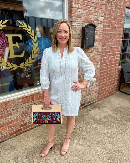 Lainey Seersucker Dress in Seafoam + White, available in sizes XS–XL. Features lightweight, striped fabric and relaxed fit.
