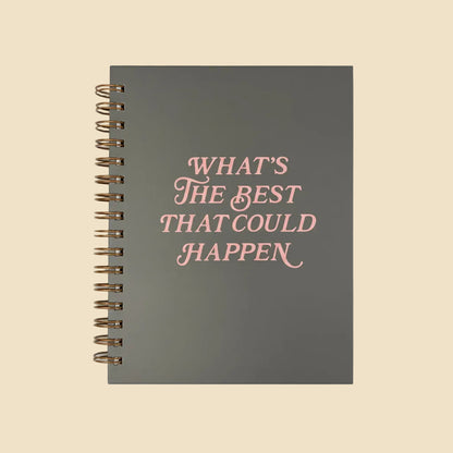 Gray, scratch-resistant spiral-bound journal with pink “What’s the Best That Could Happen” text and lined pages. Sizes: available.