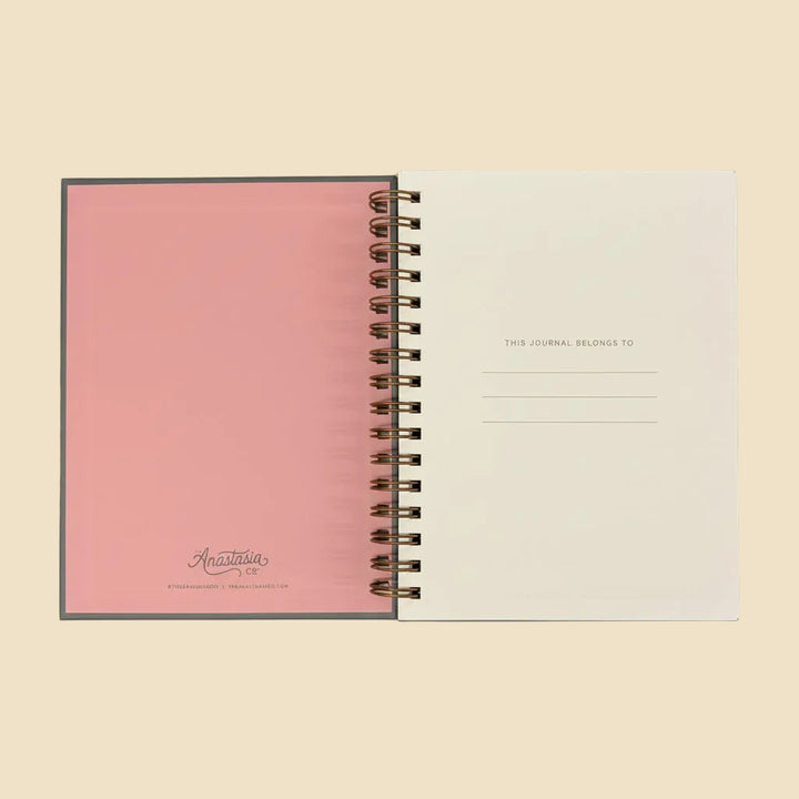 Hardcover journal with scratch-resistant cover, pink left inside, "This Journal Belongs To" title page. Available in multiple sizes.