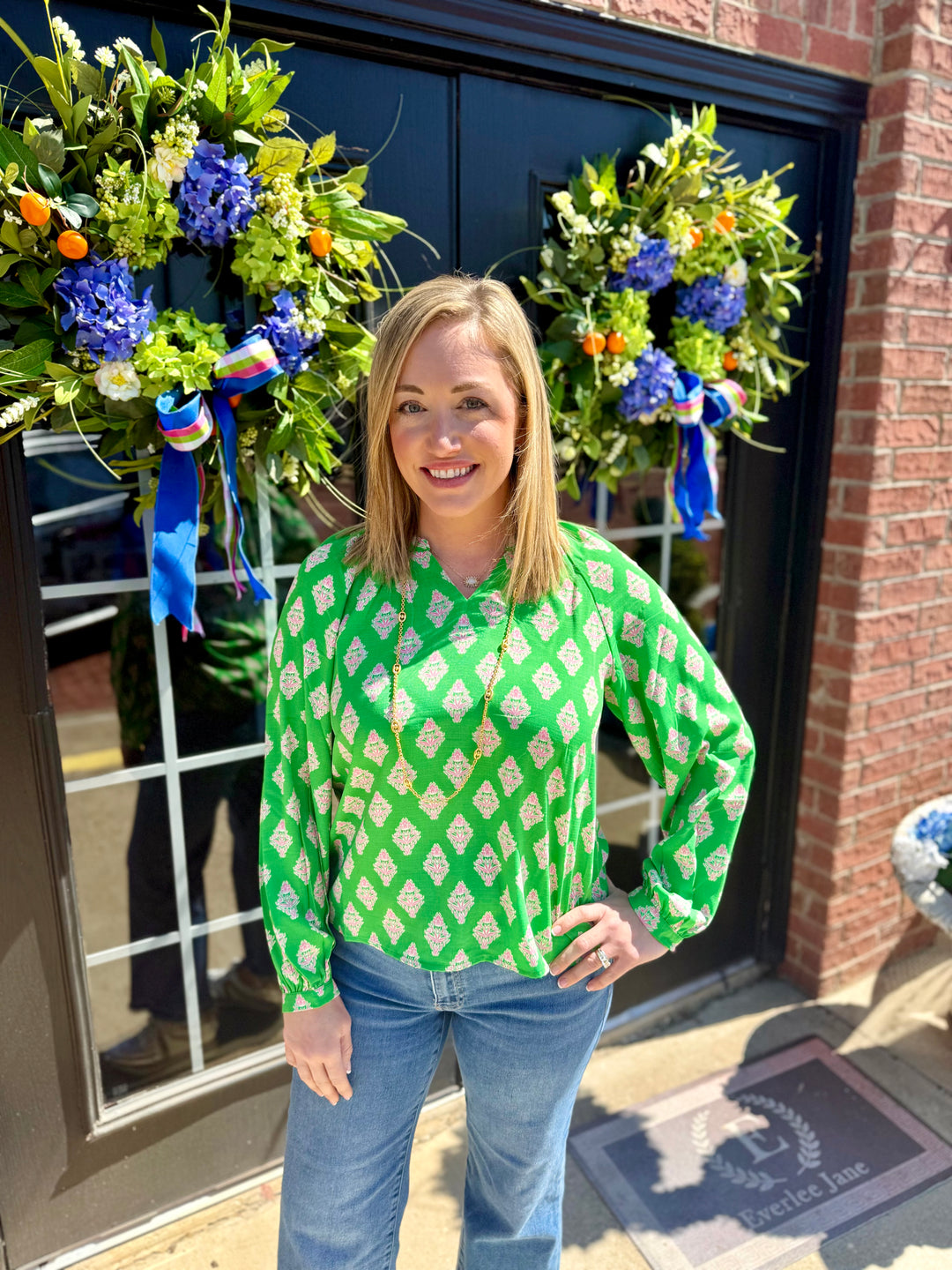 Scarlette Early Riser Green Top with flowy fit and V-neckline. Available in sizes S-XL.