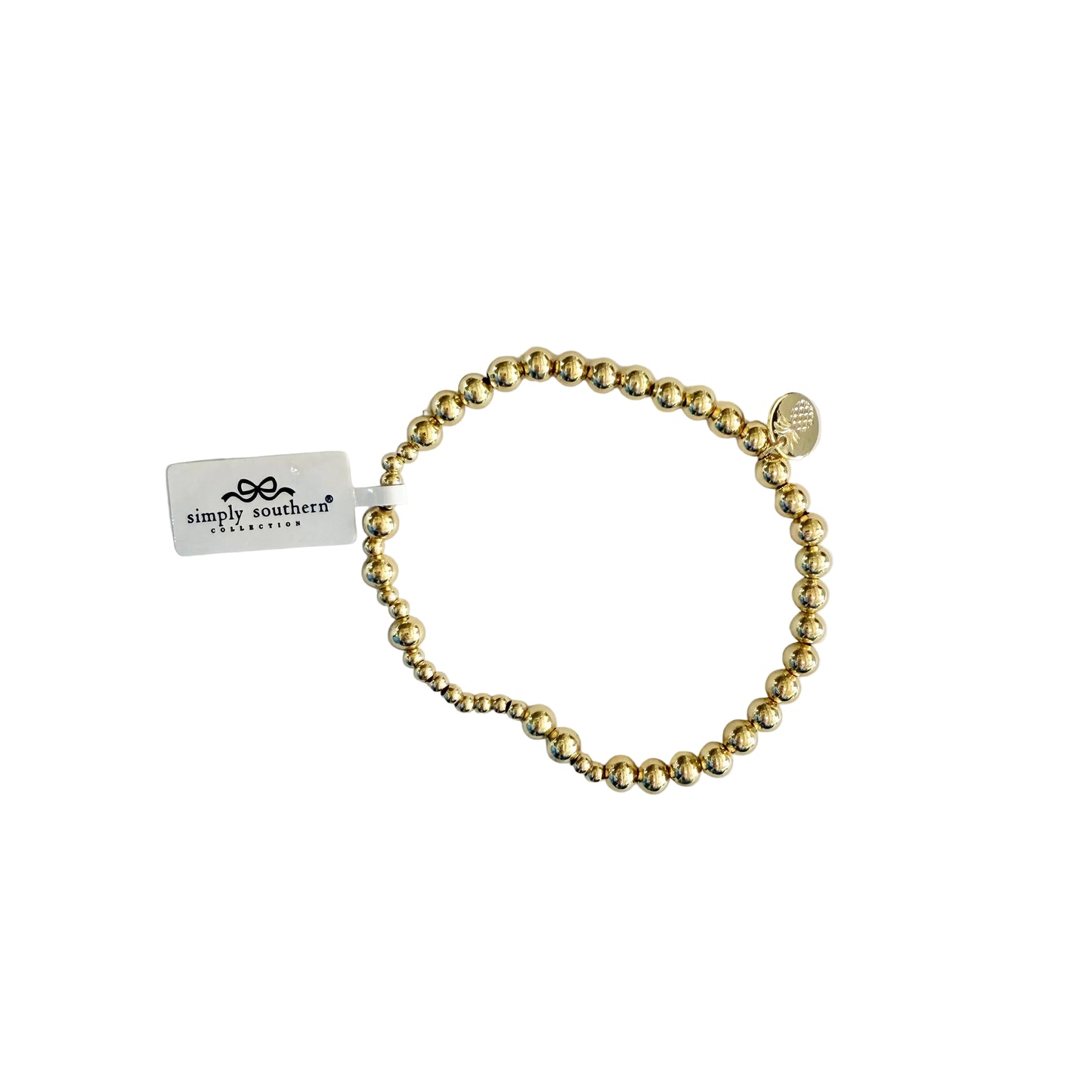 Gold beaded bracelets with accent beads, stretch fit, round charm, and Simply Southern tag. Available in S/M and M/L sizes.