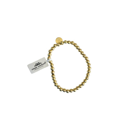 Gold beaded bracelets with accent beads, small round charm, white "Simply Southern" tag. Available in S, M, L.