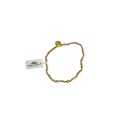 Gold beaded bracelet with accent beads, round charm, Simply Southern tag. Available in sizes S/M and M/L.