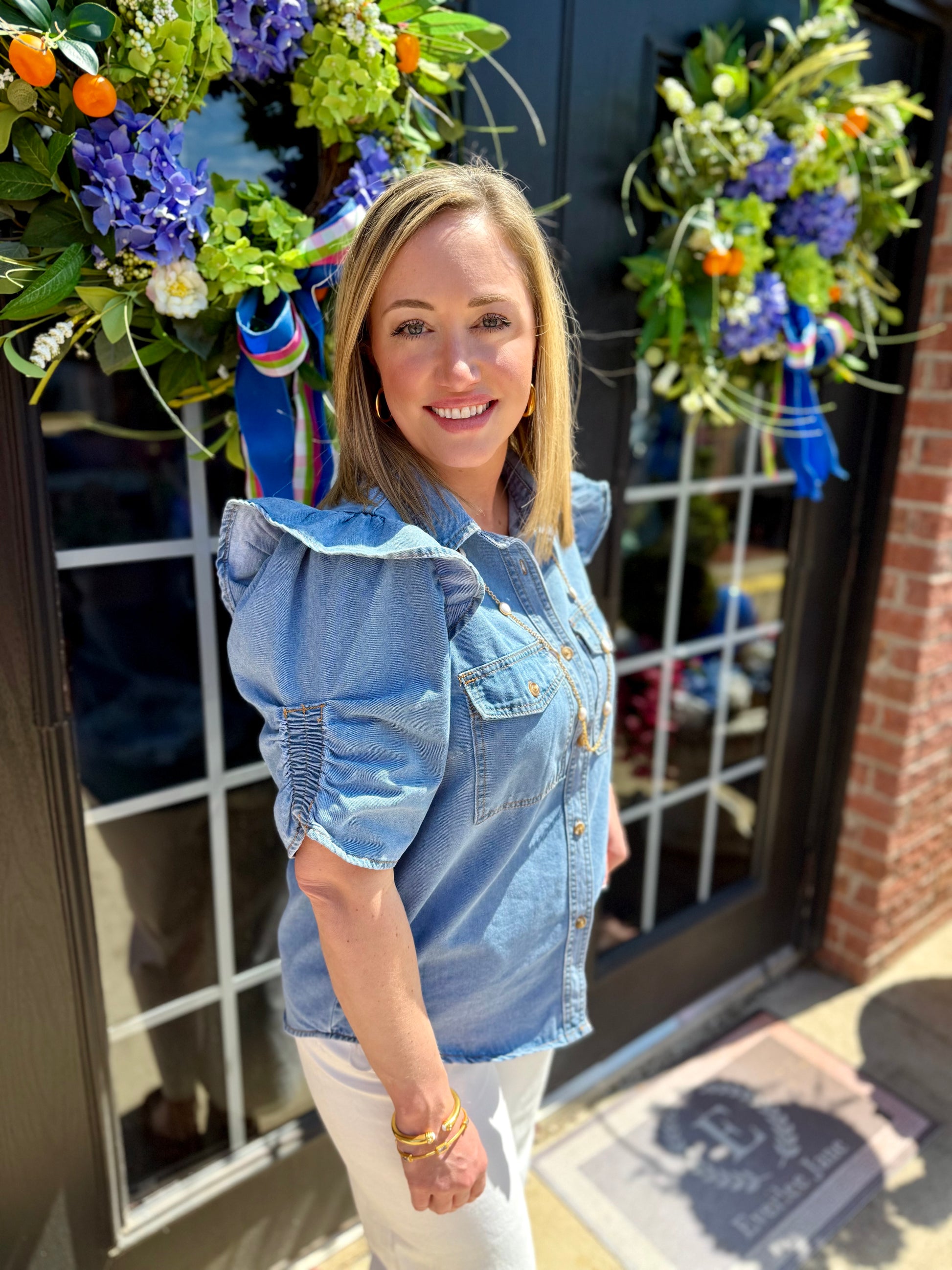 Ruffle Detail Button-Up Denim Shirt, available in sizes XS-XL.