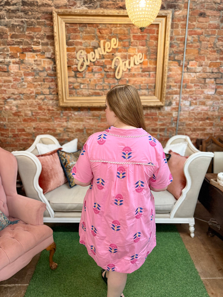Pink Floral Embroidered Dress with detailed stitching. Available in sizes S-XL.