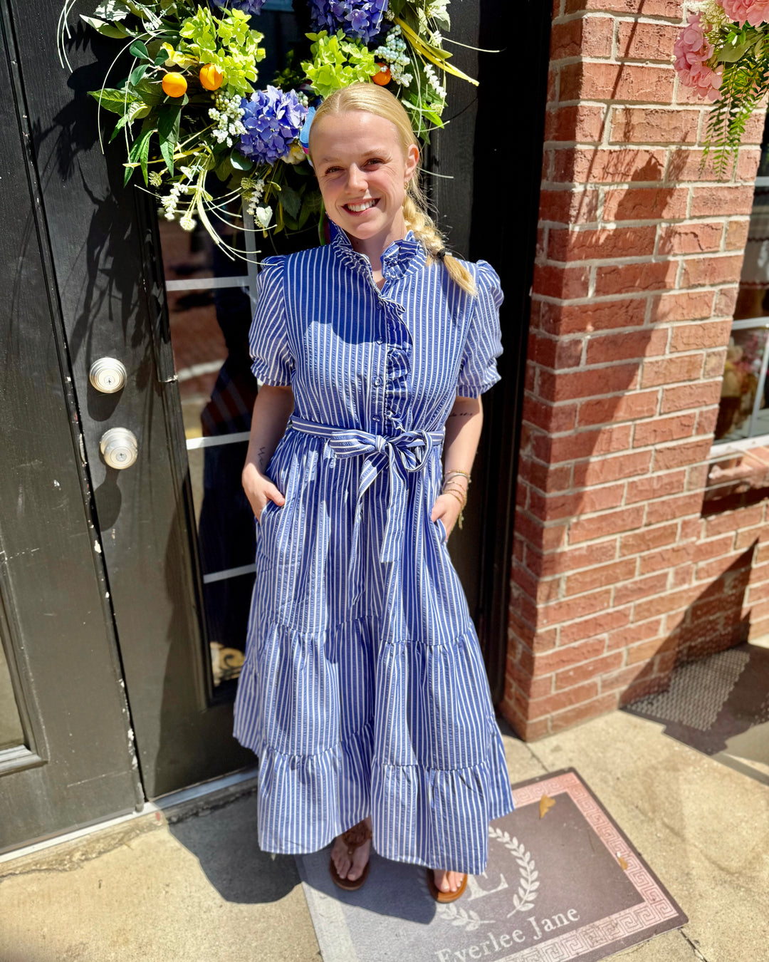 Royal Blue Tiered Stripe Midi Dress with puff sleeves and pockets. Available in sizes XS-XL.