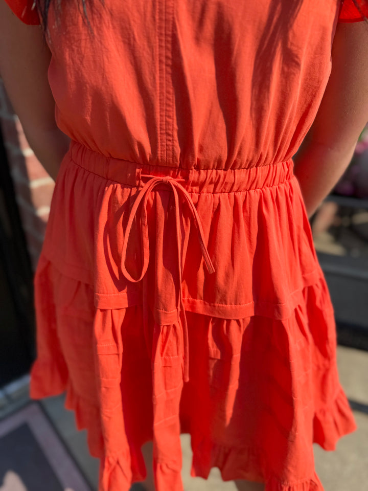 Jacket Pride Flutter Sleeve Dress in bright orange. Available in sizes XS-XL.