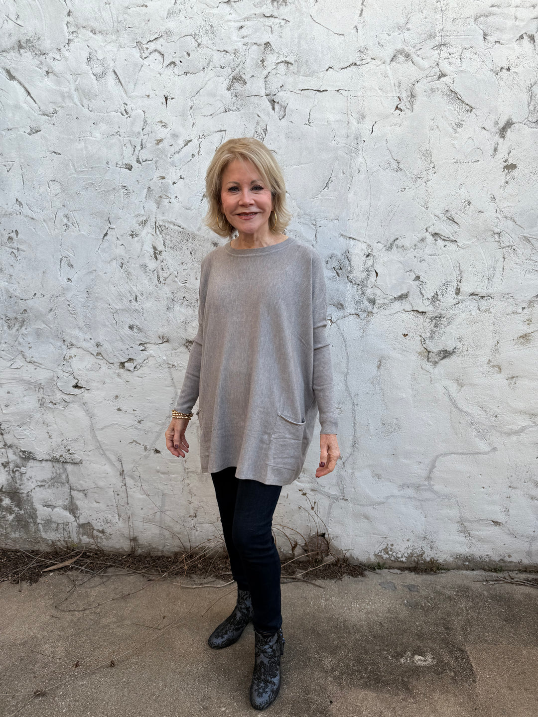Amelia Oversized Pocket Sweater Top in light gray; features large pockets. Available in S, M, L, XL.